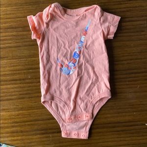 Pink nike onesie